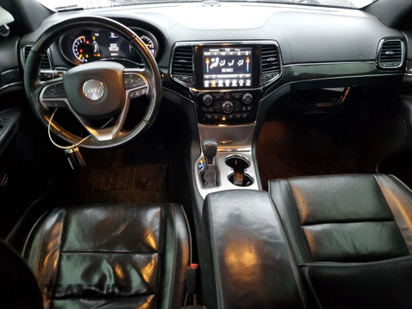 2019 Jeep Grand Cherokee Overland with VIN 1C4RJFCT7KC640527, listed as a Copart auction lot 54276725 with 282,202 mi miles and Salvage title. Bid and sale history available at DreamBid. Image 8.