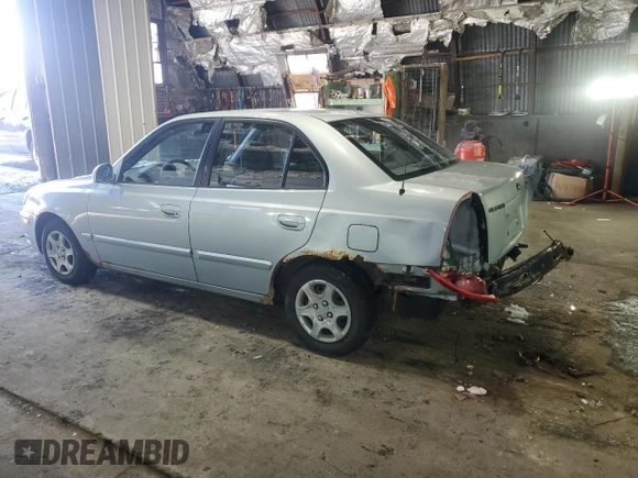 2005 Hyundai Accent GLS with VIN KMHCG45C15U602419, listed as a Copart auction lot 47759675 with 58,133 mi miles and Salvage Title. Bid and sale history available at carsss.com. Image 2.