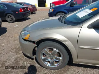 2002 Dodge Stratus z VIN 1B3AL56R62N154704, wystawiony jako IAAI lot #41879628 z przebiegiem 91 193 mil mil oraz . Historia ofert i sprzedaży dostępna na DreamBid. Obrazek 6.