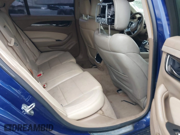 2014 Cadillac CTS Luxury RWD with VIN 1G6AR5SX9E0155626, listed as a IAAI auction lot 41271029 with 99,038 mi miles. Bid and sale history available at carsss.com. Image 8.