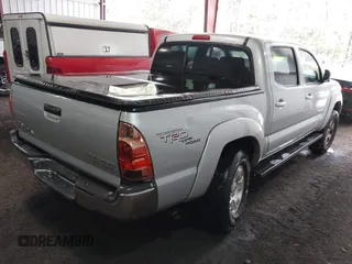 2006 Toyota Tacoma PreRunner with VIN 3TMJU62NX6M008567, listed as a IAAI auction lot 42065242 with 233,552 mi miles and . Bid and sale history available at DreamBid. Image 4.