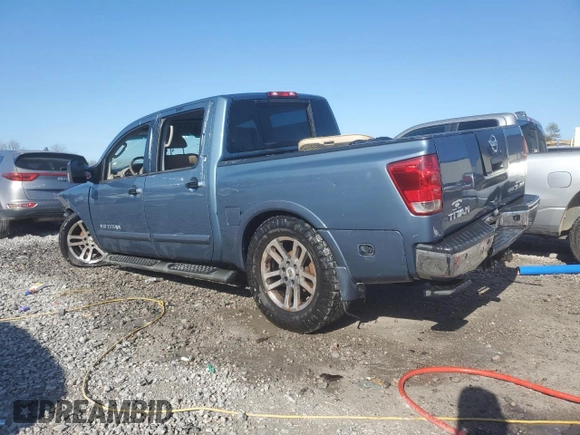 2011 Nissan Titan Pro-4X with VIN 1N6BA0ECXBN302004, listed as a Copart auction lot 89343945 with 427,682 mi miles and Salvage title. Bid and sale history available at DreamBid. Image 2.