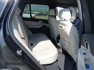 2021 BMW X5 xDrive40i with VIN 5UXCR6C01M9E66976, listed as a IAAI auction lot 42024110 with 67,877 mi miles and . Bid and sale history available at DreamBid. Image 8.