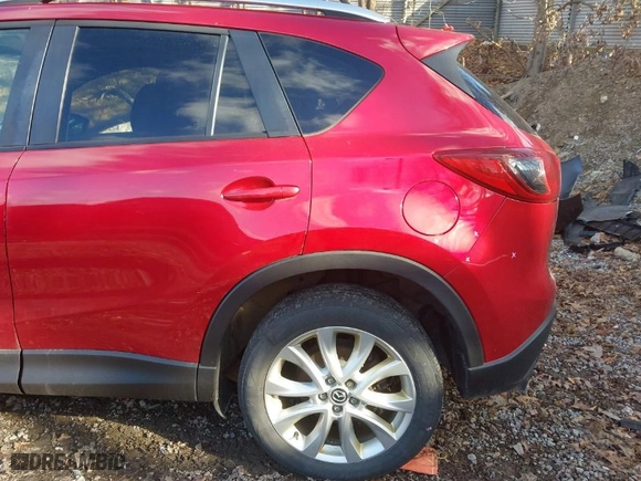 2014 Mazda CX-5 Grand Touring with VIN JM3KE2DY1E0380423, listed as a IAAI auction lot 41854206 with 129,763 mi miles. Bid and sale history available at carsss.com. Image 19.