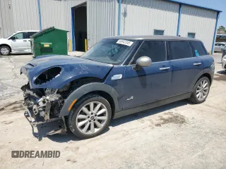 2017 MINI Clubman Cooper S z VIN WMWLU5C52H2E81102, wystawiony jako Copart lot #56942345 z przebiegiem 115 695 mil mil oraz Szkoda całkowita • Salvage title. Historia ofert i sprzedaży dostępna na DreamBid. Obrazek 1.
