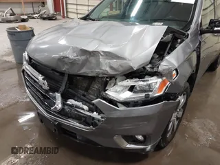 2018 Chevrolet Traverse LT Leather with VIN 1GNEVHKW2JJ220525, listed as a IAAI auction lot 41570668 with 147,721 mi miles. Bid and sale history available at carsss.com. Image 6.