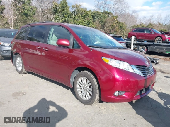 2014 Toyota Sienna XLE with VIN 5TDYK3DCXES442968, listed as a IAAI auction lot 41241310 with 132,020 mi miles and . Bid and sale history available at DreamBid. Image 1.