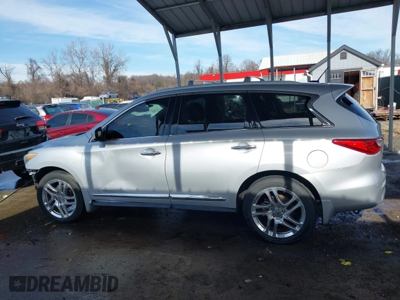 2013 Infiniti JX35 z VIN 5N1AL0MM3DC334693, wystawiony jako IAAI lot #41576207 z przebiegiem 113 677 mil mil oraz . Historia ofert i sprzedaży dostępna na DreamBid. Obrazek 14.