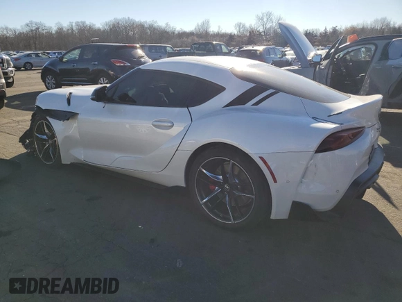 2021 Toyota Supra 3.0 с VIN WZ1DB0C02MW042827, выставлен на аукционе Copart как лот 81323404 с пробегом 35 466 миль миль и Списание • Salvage title. История ставок и продаж доступна на DreamBid. Изображение 2.