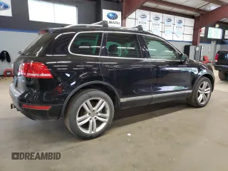 2012 Volkswagen Touareg Sport z VIN WVGEF9BP9CD011879, wystawiony jako Copart lot #56903035 z przebiegiem 198 262 mil mil oraz Czysty tytuł • Clean title. Historia ofert i sprzedaży dostępna na DreamBid. Obrazek 3.