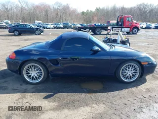 2001 Porsche Boxster z VIN WP0CA29861S620159, wystawiony jako IAAI lot #41868701 z przebiegiem 38 776 mil mil oraz . Historia ofert i sprzedaży dostępna na DreamBid. Obrazek 13.