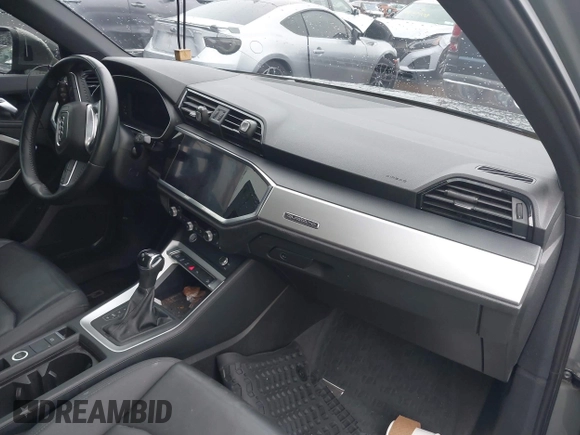 2020 Audi Q3 S line Premium with VIN WA1DECF36L1094769, listed as a IAAI auction lot 41191285 with 30,769 mi miles and . Bid and sale history available at DreamBid. Image 5.