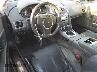 2008 Aston Martin Vantage z VIN SCFBB04B88GD08555, wystawiony jako Copart lot #73878724 z przebiegiem Nie podano mil oraz Szkoda całkowita • Salvage title. Historia ofert i sprzedaży dostępna na DreamBid. Obrazek 8.