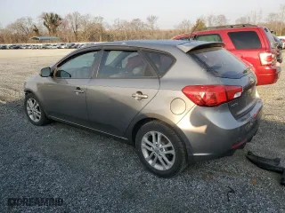 2012 Kia Forte 5-Door EX with VIN KNAFU5A28C5621907, listed as a Copart auction lot 49043625 with 151,094 mi miles and Salvage Title. Bid and sale history available at carsss.com. Image 2.