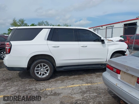 2021 Chevrolet Tahoe Commercial z VIN 1GNSKLEDXMR359932, wystawiony jako IAAI lot #42275551 z przebiegiem 24 mil mil oraz . Historia ofert i sprzedaży dostępna na DreamBid. Obrazek 12.
