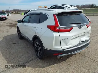 2017 Honda CR-V Touring with VIN 5J6RW2H95HL044505, listed as a IAAI auction lot 41856975 with 117,826 mi miles. Bid and sale history available at carsss.com. Image 3.