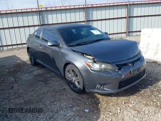 2013 Scion tC with VIN JTKJF5C7XD3063807, listed as a IAAI auction lot 41232847 with 100,510 mi miles. Bid and sale history available at carsss.com. Image 1.