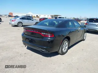 2023 Dodge Charger SXT with VIN 2C3CDXBG2PH528802, listed as a IAAI auction lot 41768288 with 57,170 mi miles. Bid and sale history available at carsss.com. Image 4.