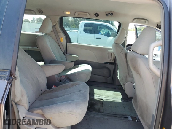 2014 Toyota Sienna L z VIN 5TDZK3DC0ES409479, wystawiony jako Copart lot #51643485 z przebiegiem 119 709 mil mil oraz Szkoda całkowita • Salvage title. Historia ofert i sprzedaży dostępna na DreamBid. Obrazek 11.
