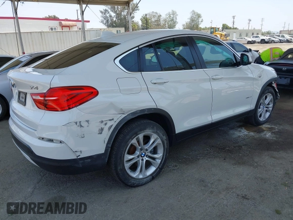 2015 BMW X4 xDrive28i with VIN 5UXXW3C5XF0M89259, listed as a IAAI auction lot 42553903 with 98,960 mi miles and . Bid and sale history available at DreamBid. Image 4.