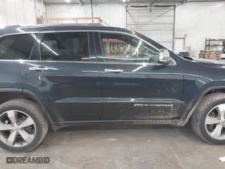 2015 Jeep Grand Cherokee Limited with VIN 1C4RJFBG8FC665320, listed as a IAAI auction lot 41884422 with 125,610 mi miles. Bid and sale history available at carsss.com. Image 13.