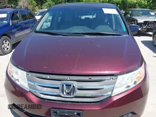2011 Honda Odyssey EX-L with VIN 5FNRL5H60BB094647, listed as a IAAI auction lot 42223712 with 202,612 mi miles and . Bid and sale history available at carsss.com. Image 12.
