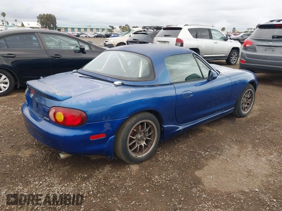 1999 Mazda MX-5 Miata with VIN JM1NB3539X0130910, listed as a IAAI auction lot 42175118 with 91,570 mi miles and . Bid and sale history available at DreamBid. Image 4.