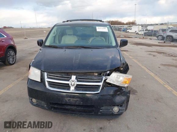 2008 Dodge Grand Caravan SXT with VIN 2D8HN54P48R827298, listed as a IAAI auction lot 41972302 with 199,903 mi miles and . Bid and sale history available at DreamBid. Image 6.
