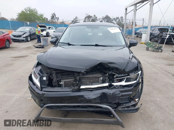 2021 Volkswagen Tiguan S with VIN 3VV1B7AX4MM025586, listed as a IAAI auction lot 41889996 with 21,777 mi miles and . Bid and sale history available at DreamBid. Image 12.