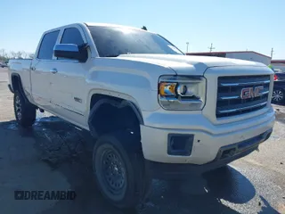 2014 GMC Sierra 1500 SLT with VIN 3GTU2VEC0EG208569, listed as a IAAI auction lot 41834893 with 128,731 mi miles and . Bid and sale history available at DreamBid. Image 1.