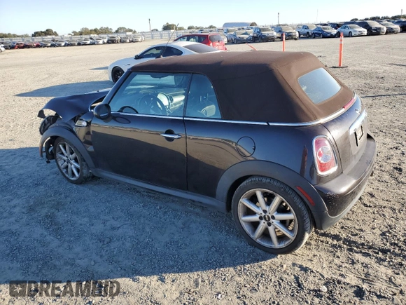 2015 MINI Convertible with VIN WMWZN3C53FT862859, listed as a Copart auction lot 71419764 with 113,356 mi miles and Salvage title. Bid and sale history available at DreamBid. Image 2.