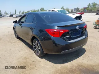 2017 Toyota Corolla L with VIN 5YFBURHE1HP712536, listed as a IAAI auction lot 42592613 with 76,672 mi miles and . Bid and sale history available at DreamBid. Image 3.