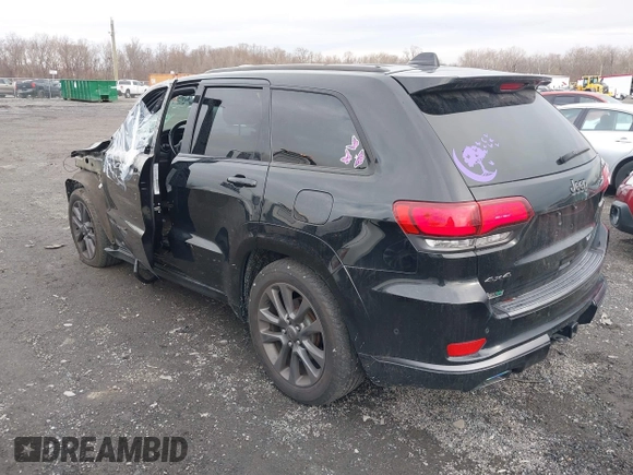 2019 Jeep Grand Cherokee High Altitude with VIN 1C4RJFCG9KC566594, listed as a IAAI auction lot 41128793 with 96,244 mi miles and . Bid and sale history available at DreamBid. Image 3.