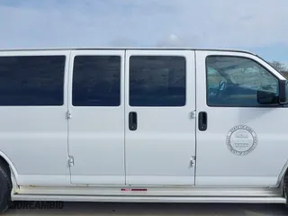 2013 Chevrolet Express Passenger 1LT with VIN 1GAZG1FA6D1191442, listed as a IAAI auction lot 41911629 with 122,796 mi miles. Bid and sale history available at carsss.com. Image 13.