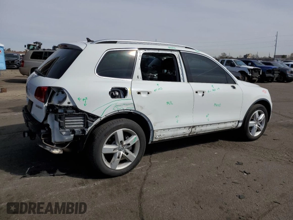 2012 Volkswagen Touareg с VIN WVGEG9BP1CD007581, выставлен на аукционе Copart как лот 47958355 с пробегом 79 649 миль миль и Списание • Salvage title. История ставок и продаж доступна на DreamBid. Изображение 3.