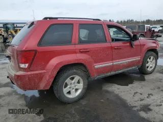 2010 Jeep Grand Cherokee Laredo with VIN 1J4PR4GKXAC120224, listed as a Copart auction lot 88764805 with 153,742 mi miles and Salvage Title. Bid and sale history available at carsss.com. Image 3.