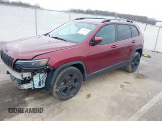 2019 Jeep Cherokee Latitude Plus with VIN 1C4PJMLB1KD319905, listed as a IAAI auction lot 41143311 with 98,694 mi miles. Bid and sale history available at carsss.com. Image 19.