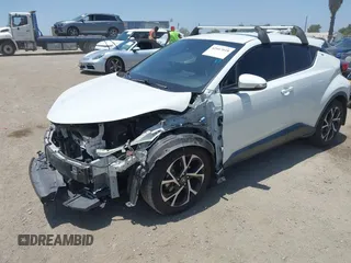 2018 Toyota C-HR XLE with VIN NMTKHMBX8JR036857, listed as a IAAI auction lot 42667018 with 63,058 mi miles and . Bid and sale history available at DreamBid. Image 2.