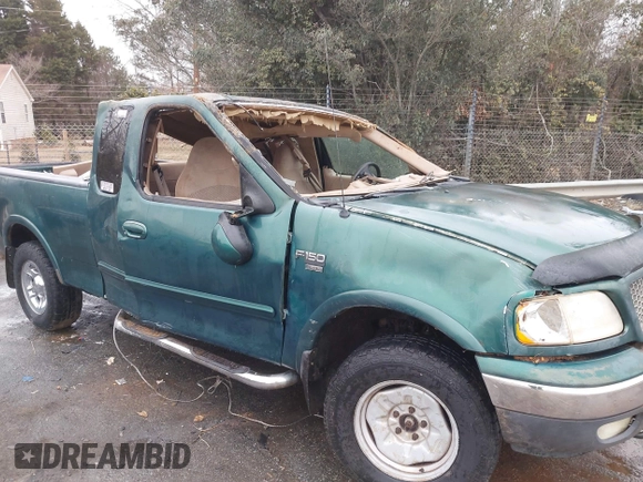 1999 Ford F-150 XL with VIN 1FTRX18L9XNA66552, listed as a IAAI auction lot 41284259 with Not provided miles and . Bid and sale history available at DreamBid. Image 12.