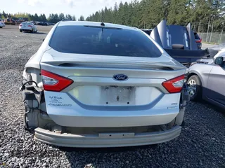 2015 Ford Fusion SE with VIN 3FA6P0H98FR267586, listed as a IAAI auction lot 41987958 with 136,919 mi miles. Bid and sale history available at carsss.com. Image 17.