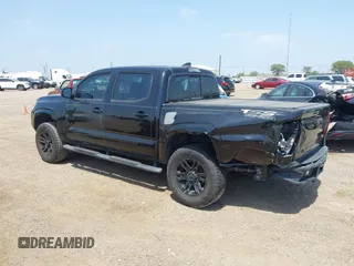 2018 Toyota Tacoma SR with VIN 5TFAX5GN5JX126118, listed as a IAAI auction lot 41949791 with 37,615 mi miles and . Bid and sale history available at DreamBid. Image 3.