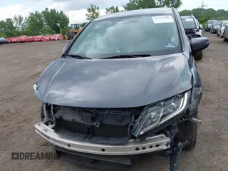 2020 Honda Odyssey EX with VIN 5FNRL6H54LB025555, listed as a IAAI auction lot 42512480 with 95,425 mi miles and . Bid and sale history available at DreamBid. Image 6.