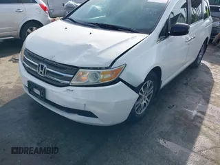 2011 Honda Odyssey EX-L with VIN 5FNRL5H6XBB059162, listed as a IAAI auction lot 42061378 with 164,317 mi miles and . Bid and sale history available at carsss.com. Image 6.