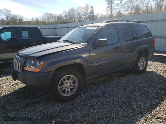 2004 Jeep Grand Cherokee Laredo with VIN 1J4GX48N14C435481, listed as a Copart auction lot 87855975 with 176,273 mi miles and Salvage Title. Bid and sale history available at carsss.com. Image 1.