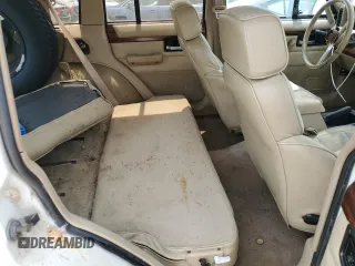 1993 Jeep Cherokee Country with VIN 1J4FJ78S6PL504836, listed as a Copart auction lot 59434224 with 150,581 mi miles and Non Repairable. Bid and sale history available at carsss.com. Image 10.