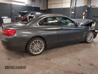 2014 BMW 4 Series 428i xDrive with VIN WBA3T1C59EPS98299, listed as a IAAI auction lot 41741235 with 93,000 mi miles and . Bid and sale history available at carsss.com. Image 4.