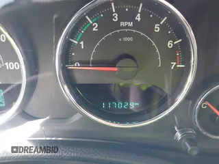 2014 Jeep Wrangler Unlimited Sport with VIN 1C4BJWDG9EL309763, listed as a IAAI auction lot 41378132 with 117,029 mi miles. Bid and sale history available at carsss.com. Image 7.