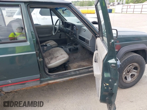 1993 Jeep Cherokee Sport with VIN 1J4FJ68S2PL622716, listed as a IAAI auction lot 42570145 with 183,159 mi miles and . Bid and sale history available at DreamBid. Image 5.