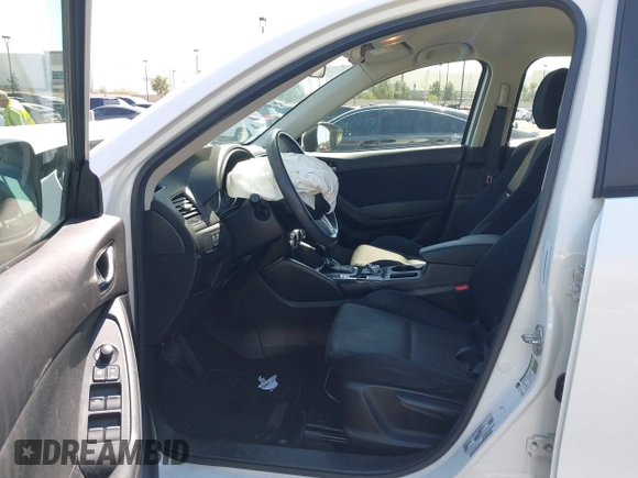 2016 Mazda CX-5 Sport with VIN JM3KE2BY9G0825285, listed as a IAAI auction lot 41841833 with 96,915 mi miles. Bid and sale history available at carsss.com. Image 5.