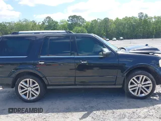 2015 Ford Expedition Platinum with VIN 1FMJU1MT1FEF12442, listed as a IAAI auction lot 42144296 with 150,759 mi miles and . Bid and sale history available at DreamBid. Image 13.